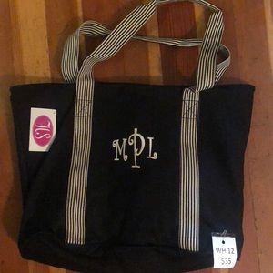 Black monogrammed tote bag